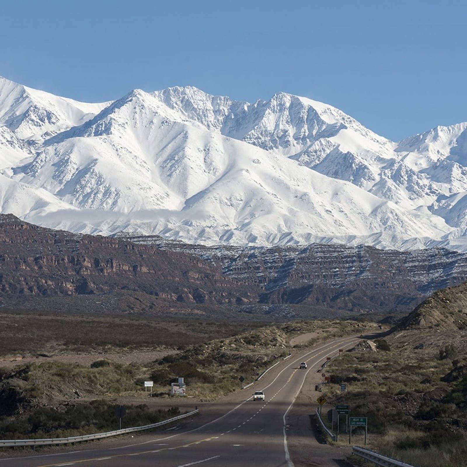 Route 7 winding between snow-capped peaks of the Andes